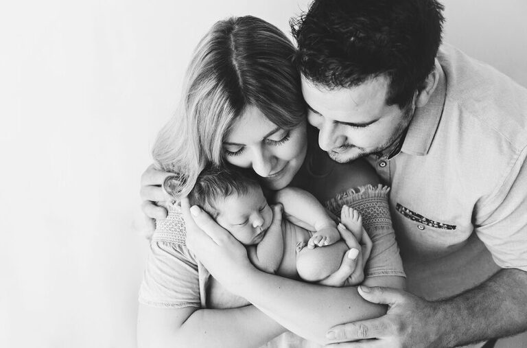 parents with newborn baby - trinity newborn photographer