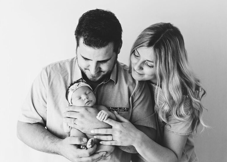 parents with newborn baby - trinity newborn photographer