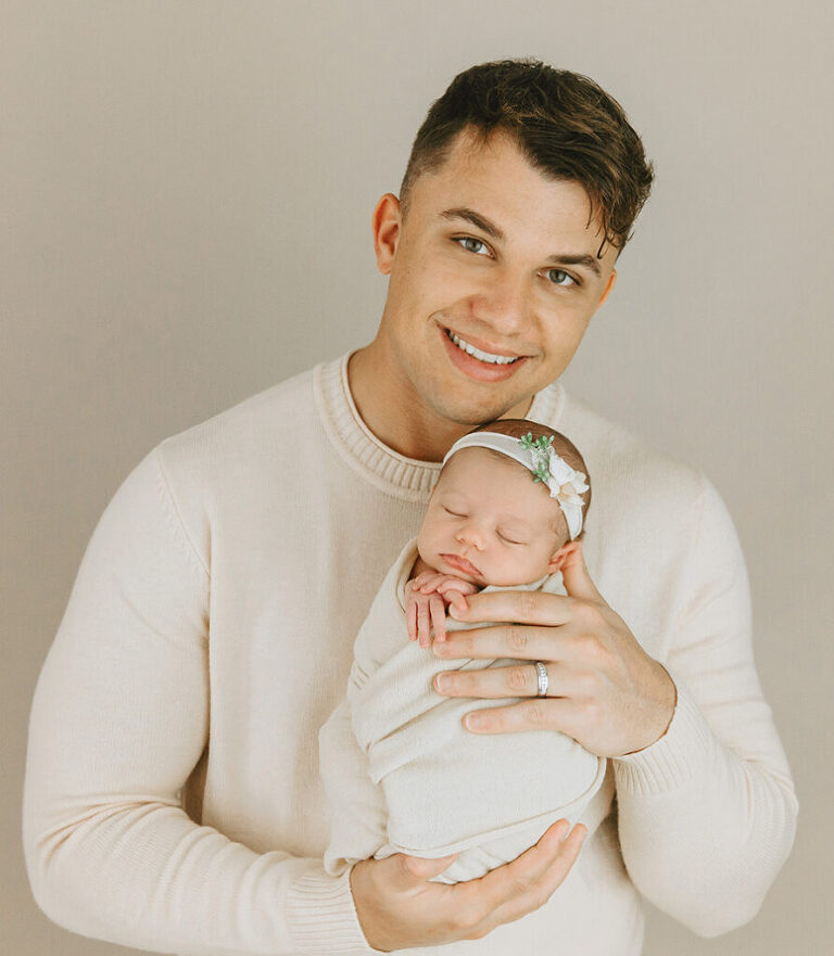 dad with newborn baby