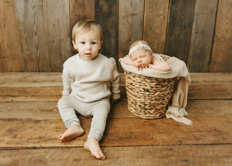  sibling with newborn baby